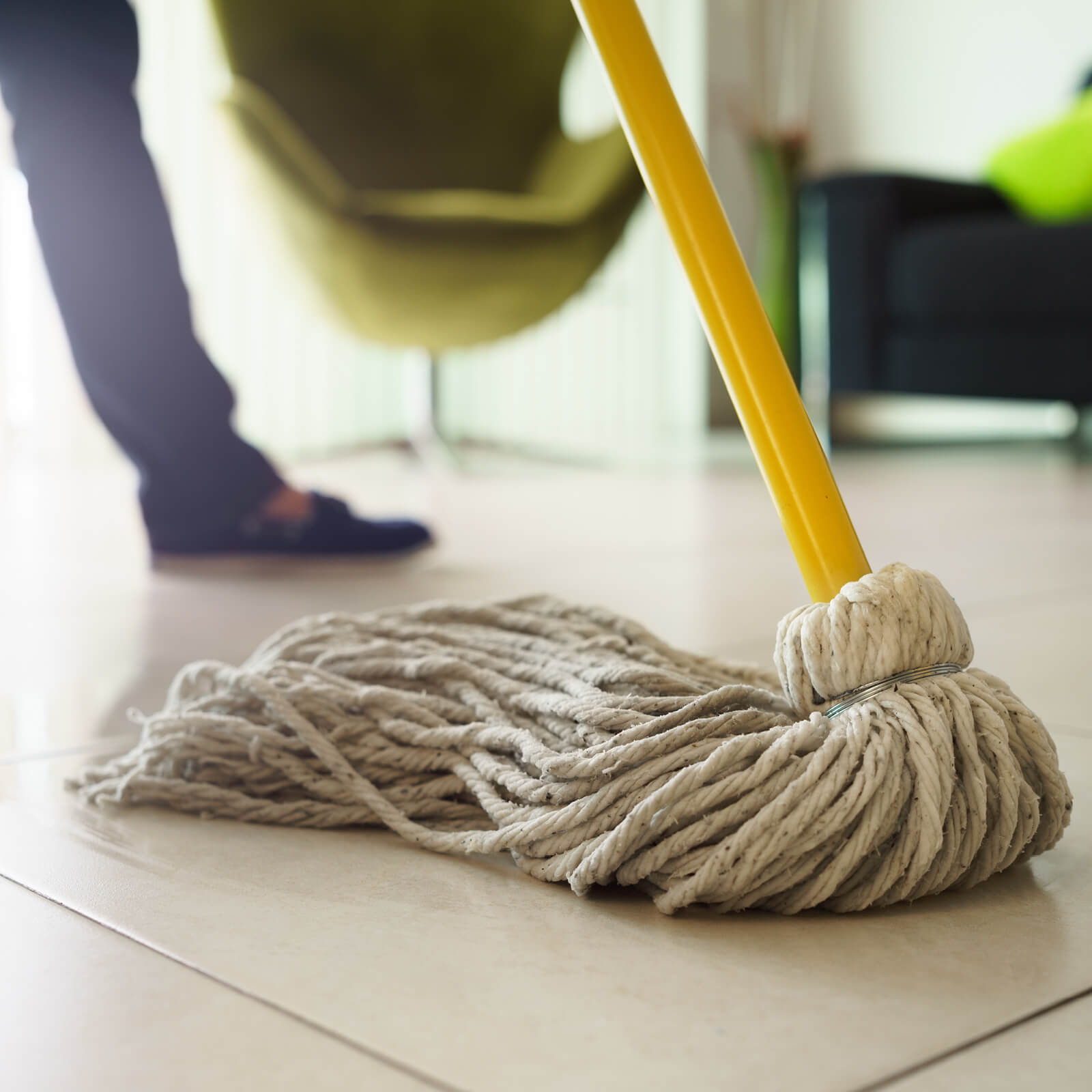 Mopping a tile floor | Allied Flooring & Paint