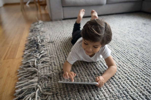 Girl lying on rug | Allied Flooring & Paint
