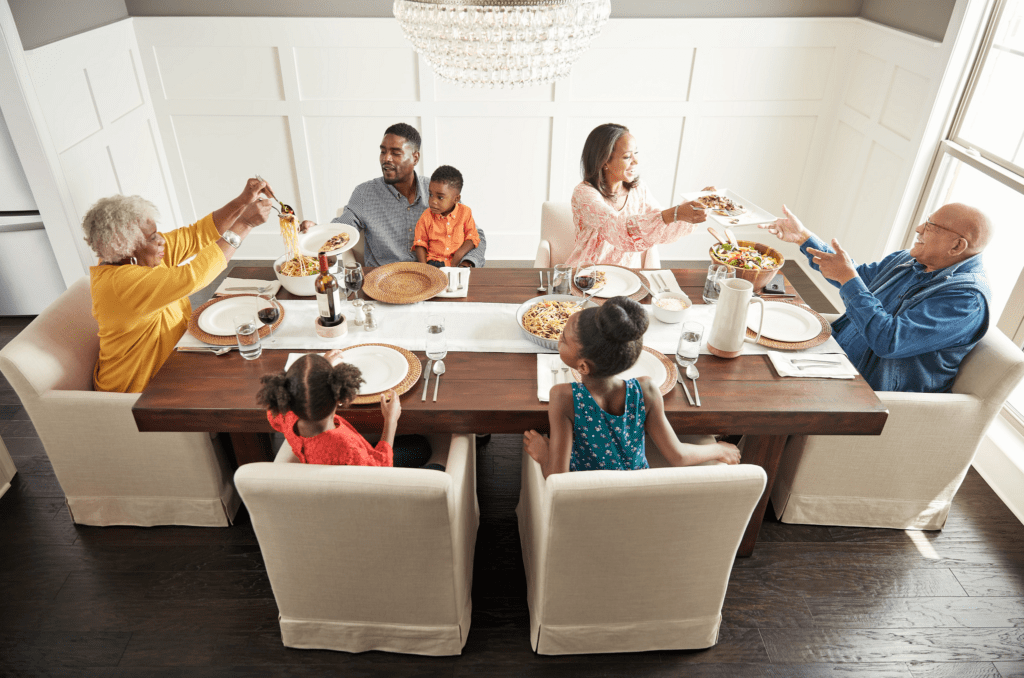 Family having breakfast at the dining table | Allied Flooring & Paint